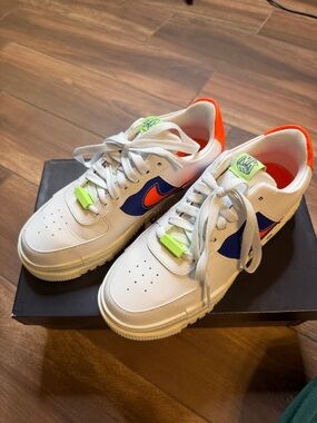 Nike White/Blue/Orange Low-Top Sneakers with Neon Green Accent